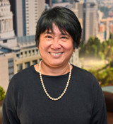 A person smiling for the camera.