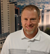 A man smiling for the camera.