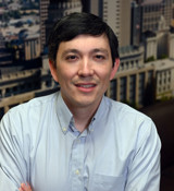 A man smiling for the camera.