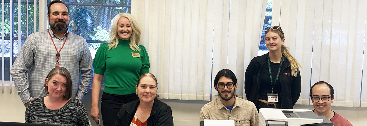 A group of people posing for a photo.
