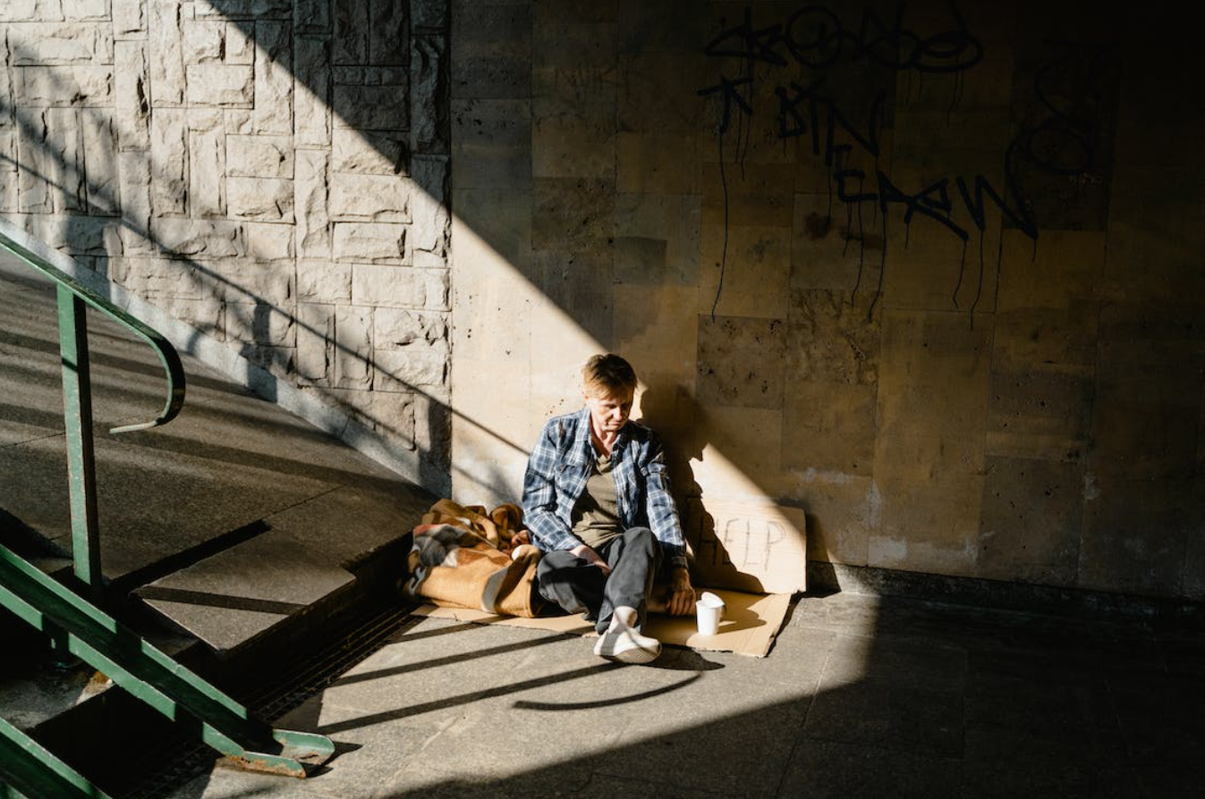 A man sitting on the stairs.