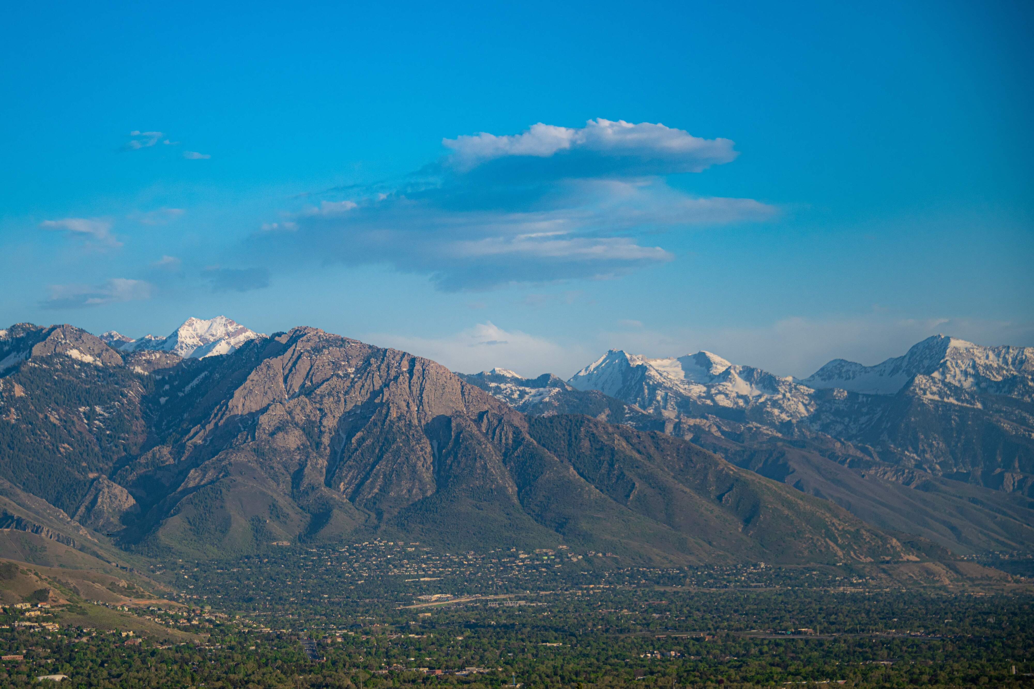 A landscape with mountains in the back.