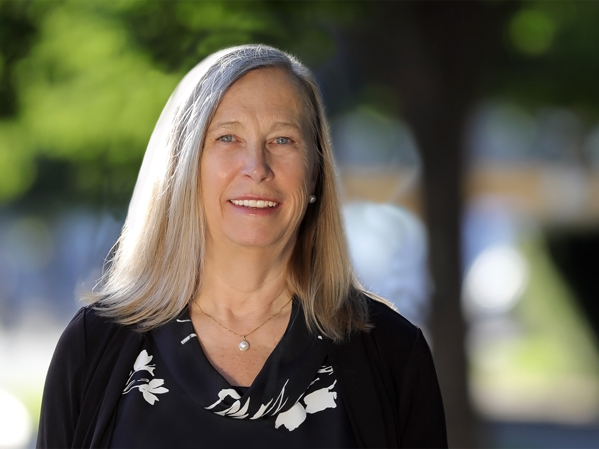 A person smiling for the camera.