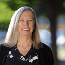 A person smiling for the camera.