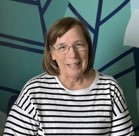 A woman wearing glasses.