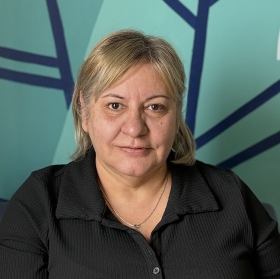 A person smiling for the camera.