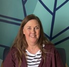 A person smiling for the camera.