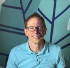 A man wearing glasses.