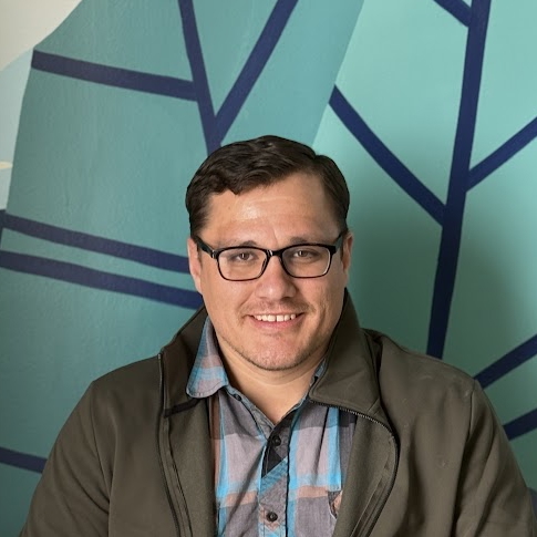 A man wearing glasses.