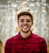 A man smiling for the camera.