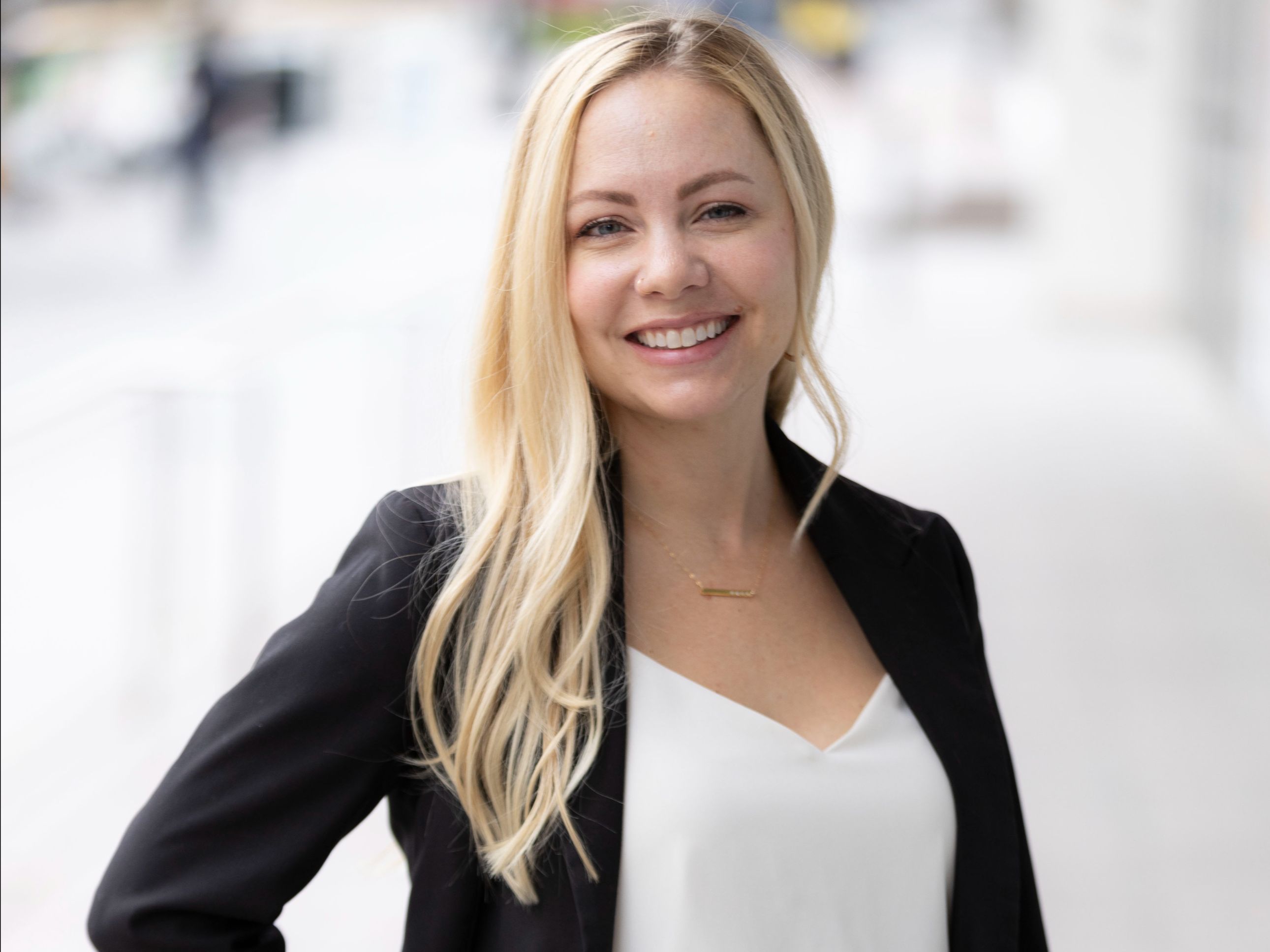 A woman smiling at the camera.
