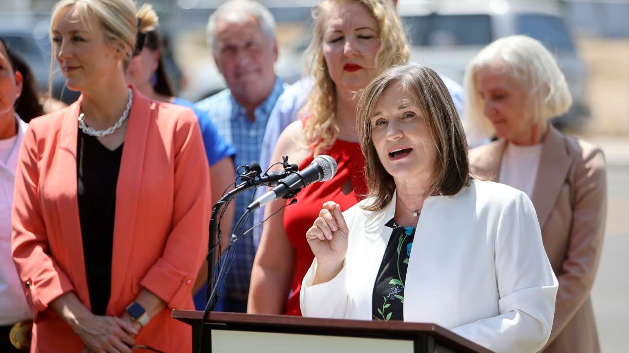 A person speaking into a microphone.