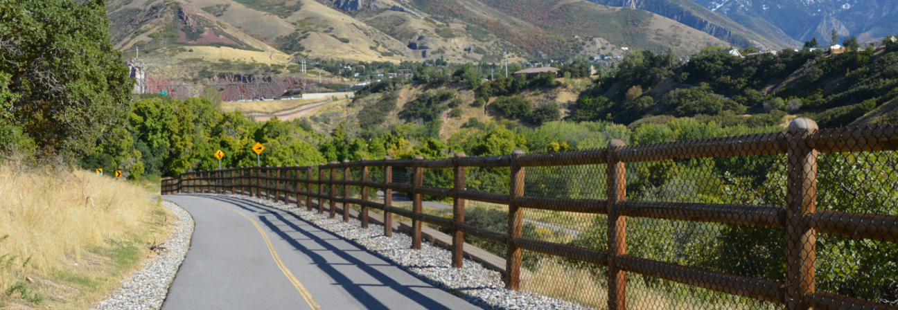 A road with a fence along it.